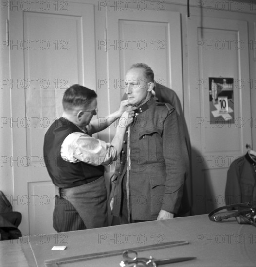 Tailoring of uniforms; fitting; 1939.