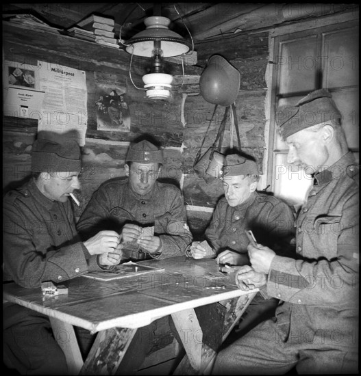 Soldiers of air raid defence playing cards, Valais 1940.
