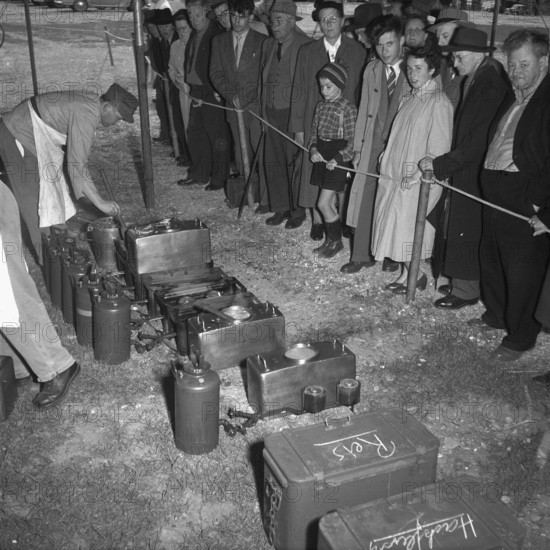 Forager demonstrating field kitchen, Zurich 1955.