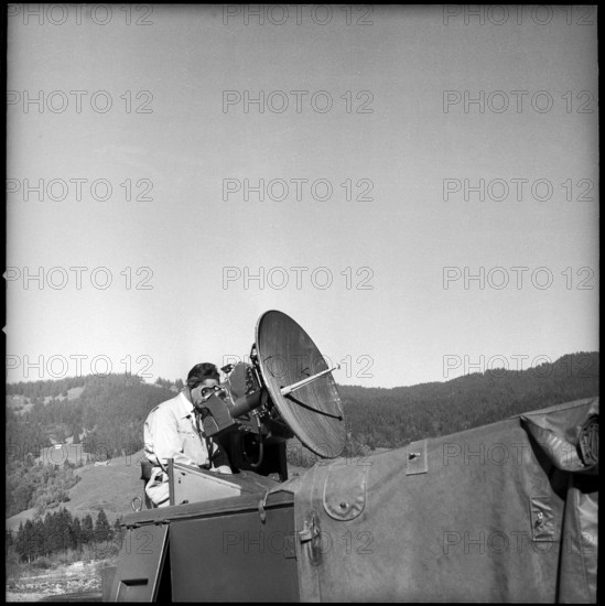 Soldier at radar antenna of fire control system, Studen 1959.