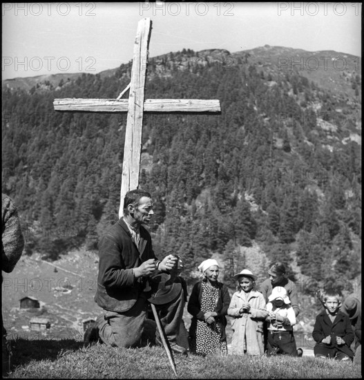 Farmers praying in the Turtmanntal valley, Switzerland, 1940.