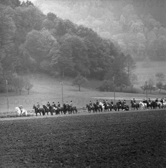Fox hunting; foxhunting, 1958.
