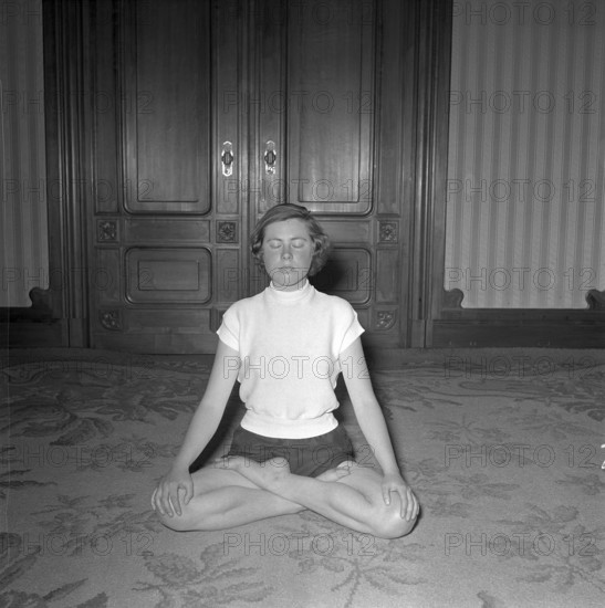 Woman doing yoga, 1953.