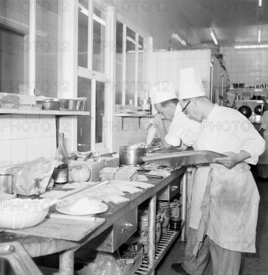 Geneva 1950: Cooks cooking in the kitchen of the du Rhone hotel.