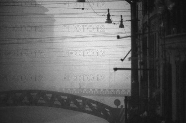 1975, Milan, Navigli in fog.