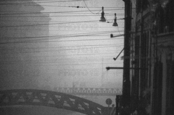 1975, Milan, Navigli in fog.