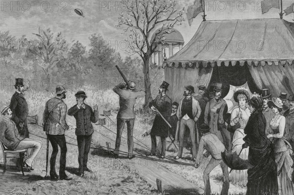 London, England. Bloodless Sport, the Terra-Cotta Pigeon at the Ranelagh Club. A clay blank in the shape of a plate, with a very hard cardboard-stone handle attached to the rim, replaces the pigeon to prevent its death by the practice of this sport. Drawing by Juan Comba. Engraving by Tomas Carlos Capuz (1834-1899). La Ilustracion Espanola y Americana (The Spanish and American Illustration), 1883.
