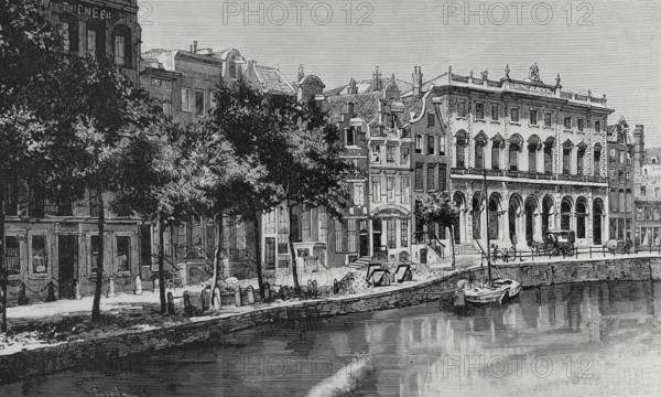 Amsterdam, Netherlands. Nieuwezijds Voorburgwal street and canal with the Royal Post Office on the right. Engraving by Tomas Carlos Capuz (1834-1899). La Ilustracion Espanola y Americana (The Spanish and American Illustration), 1883.