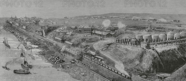 Tsaritsyn (present-day Volgograd), Russia. General view of the port and town. Storage tanks of refined oil from the Baku oil fields. Engraving by Bernardo Rico (1825-1894). The Spanish and American Illustration (La Ilustracion Espanola y Americana), 1884.