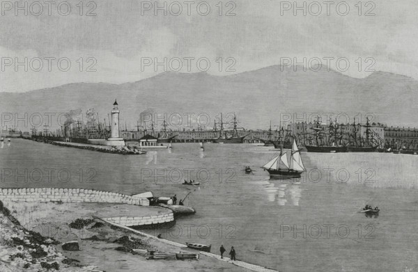 Marseille, France. View of the new port, taken from the sea, in front of the lighthouse. Engraving by Bernardo Rico (1825-1894). The Spanish and American Illustration (La Ilustracion Espanola y Americana), 1884.
