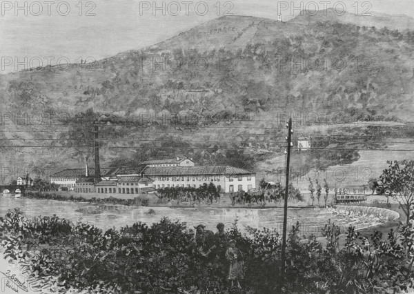 History of Spain. Tolosa, Basque Country. Exterior view of the paper mill ""La Guadalupe"", next to the river Oria. Drawing by Juan Comba. Engraving by Tomas Carlos Capuz (1834-1899). The Spanish and American Illustration (La Ilustracion Espanola y Americana), 1884.