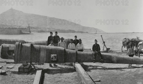 History of Spain. Ceuta. Three Krupp 260 mm (10.2 inch) guns, which the Spanish government assigned to the city's fortifications, on the quay where they were disembarked. Engraving by Vela. The Spanish and American Illustration (La Ilustracion Espanola y Americana), 1884.