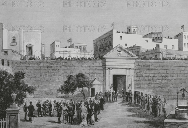 San Juan, Puerto Rico. Ceremony of assumption of office of the higher government of the island. It was costumary in the city for the new Captain General to make his public entrance, on his way to celebrate the ceremony, through the Gate of San Justo, before which the Acting Governor General presented him with the Keys of the City, as a sign of homage and obedience to his orders. Presentation of the Keys of the City to the new Governor-Captain General of Puerto Rico, Mr Ramon Fajardo Izquierdo (1826-1888), in front of the Gate of San Justo, on 19 September 1884. Engraving by Vela. The Spanish and American Illustration (La Ilustracion Espanola y Americana), 1884.