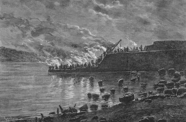 Cudillero, Asturias, Spain. Night work at the construction of the new quay, taking advantage of the low tide. Drawing from life by Tomas Campuzano (1857-1934). Engraving by Tomas Carlos Capuz (1834-1899). The Spanish and American Illustration (La Ilustracion Espanola y Americana). December 15, 1884.