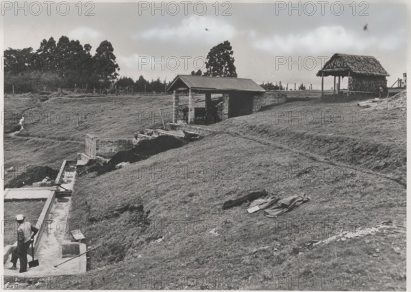 A tank where the coffee beans are first soaked before descending to the machinery house further down