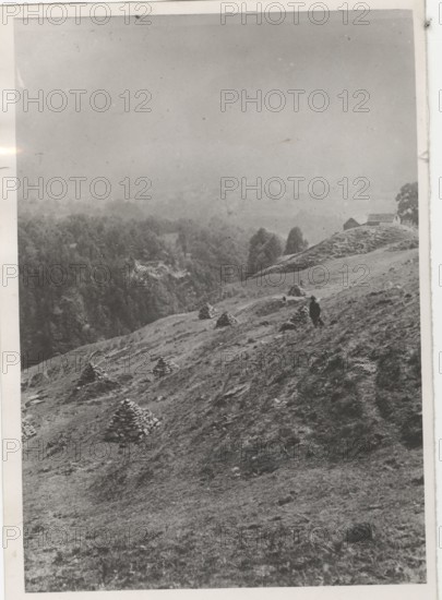 Land reclamation works the removal of stones and grit from a mountain pasture