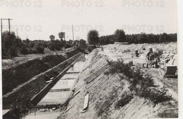 Hydraulic works in Valtidone, Italy. The enlargement and coating of the countour canal's concrete basement.