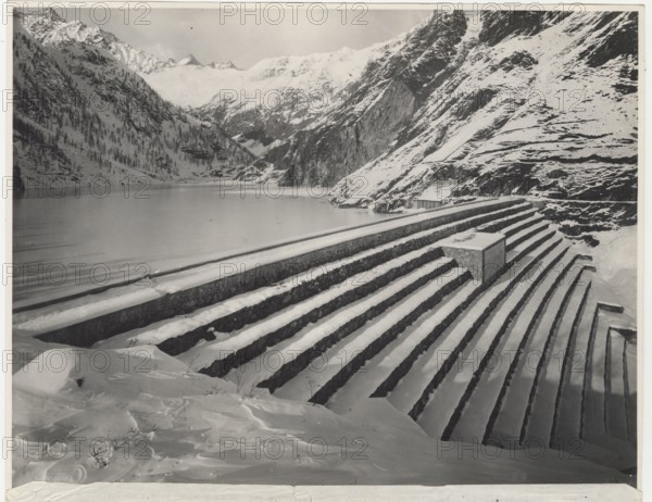 Lake Fregabolgia the building of the dam. Carona, Italy