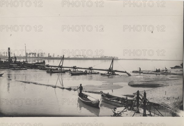 Po River land reclamation works, the filling with sand using dredges