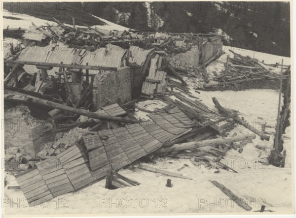Old rural building destroyed by the snow in Carnia, Italy