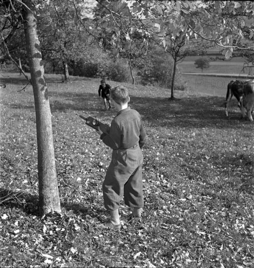 Boys with military radio set Handy-Talkie, Oensingen 1949.