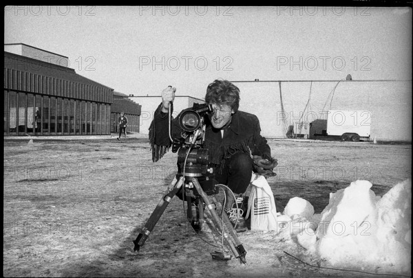 Olympic games Lake Placid 1980: Peter Muller with film camera.
