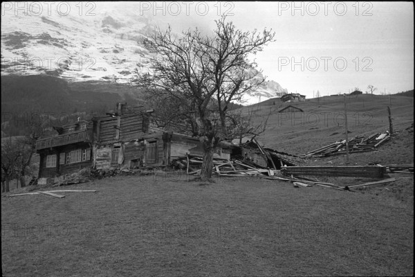 Grindelwald; buildings damaged by fohn storm; 1962.