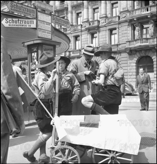 Zurich: Boy scouts collecting money on the street 1942.