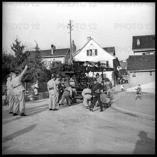 Men of the war fire brigade with fire ladder, 1939.