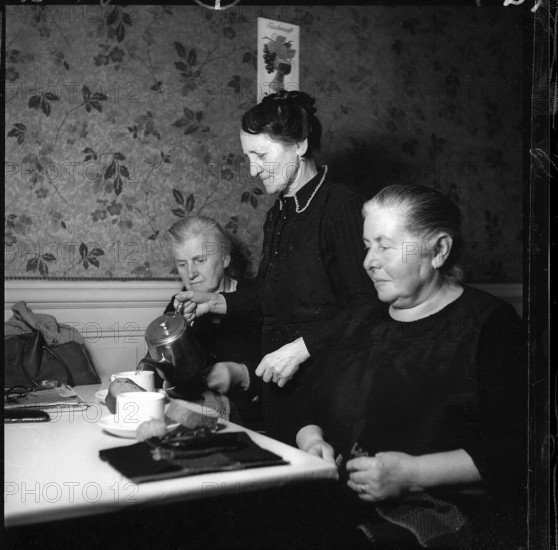 Elderly Women Drinking Coffee.