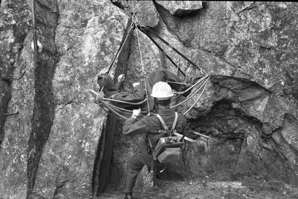Soldier at rescue training in the rocks, Andermatt 1970.