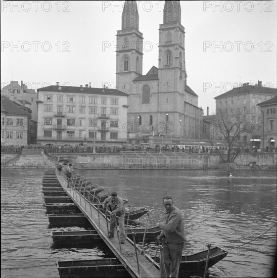 Pontooneers building rapid gangplank across Limmat, Zurich 1959.