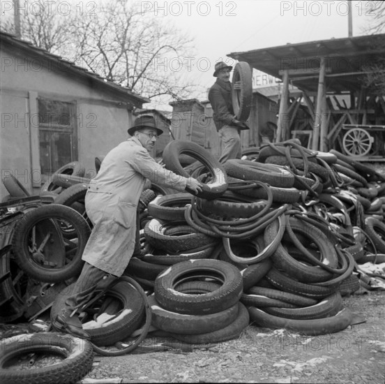 WW 2: economy of war; sorting old tyres.