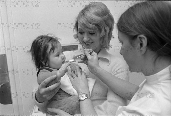 Vaccination of a baby at Pflegerinnenschule Zurich 1973.