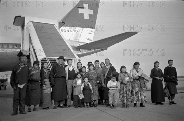 Tibetan refugees arriving at Zurich airport 1963.