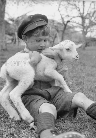 Farmer's boy with lamb, Drone 1944.