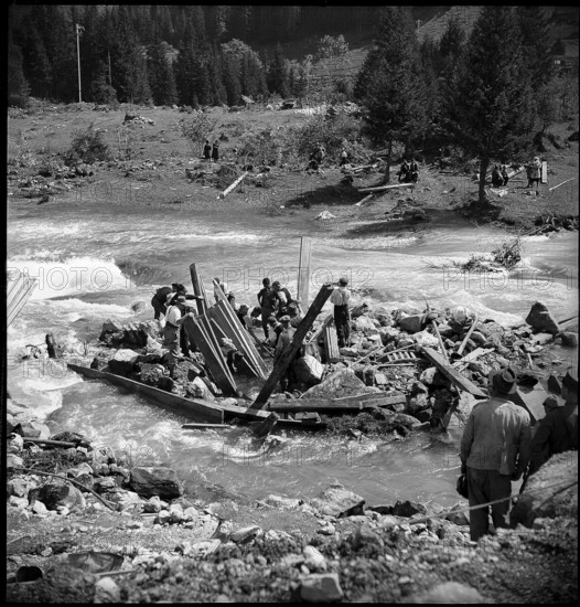 Men doing clearance work after landslide in the Kandertal valley; 1945.