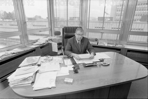 SDA managing director Georges Duplain in his office, 1971.