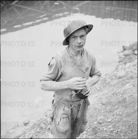 Young miner, building site Rheinau power station 1953.