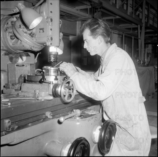 CERN: Metal worker at the router 1958.