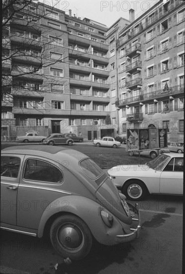 Geneva: billboard and parked cars, Rue Henri  Mussard; 1966.