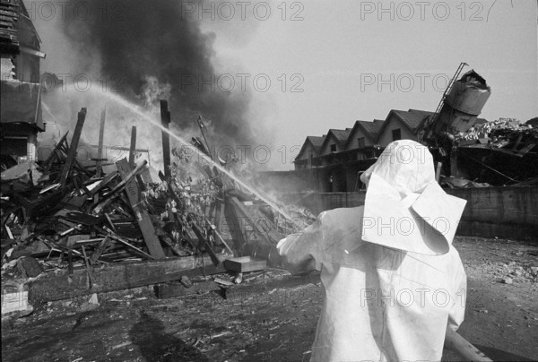 Civil defence people training disaster operation, 1971.