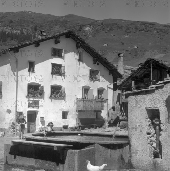Hinterrhein: girls at a fountain; 1961.