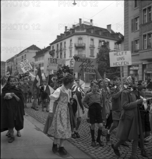 Children collecting money for Swiss donation, 1945.