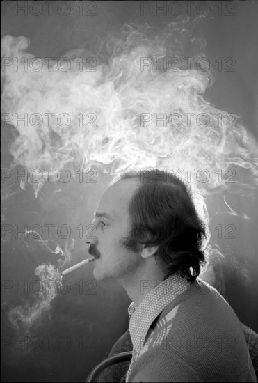 Man smoking cigarette, 1973.