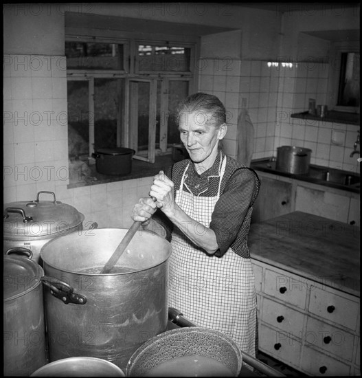 Woman cooking, Old-Age Home Gais, 1947.