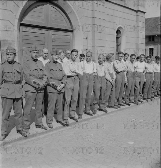 Kitting out of newly called up recruits; 1940.