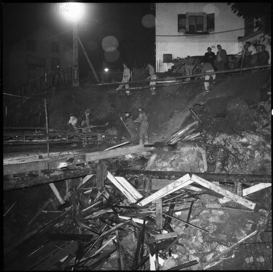 St Gallen; search for missed workers in excavation; 1957.