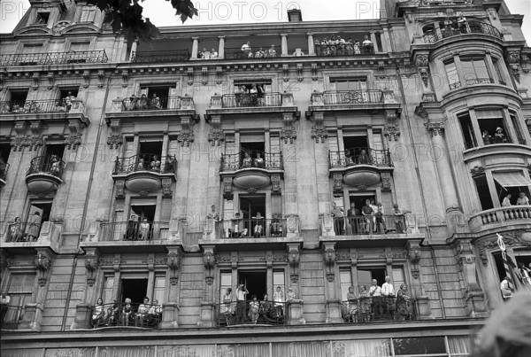 Spectators at the procession at the Fetes de Geneve, 1967.