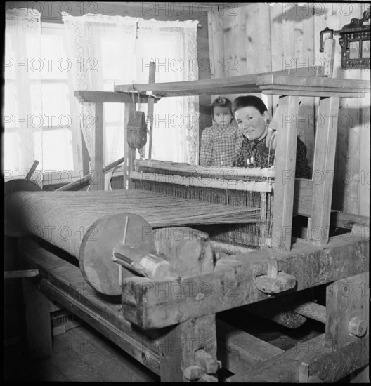 Woman working at the loom, 1945.
